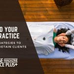 A Reiki practitioner applying healing techniques to a relaxed client, illustrating effective methods on how to get Reiki clients for a successful practice. The image is branded by Massage Magazine Insurance Plus with the headline "Expand Your Reiki Practice: Proven Strategies to Attract and Retain Clients"