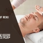 A man receiving a Reiki healing session with hands placed above his head. 'Types of Reiki' text overlay with Massage Magazine Insurance Plus+ branding